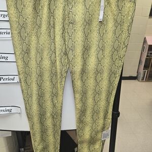 ASOS DESIGN leather-look straight-leg pants in a green snake print.